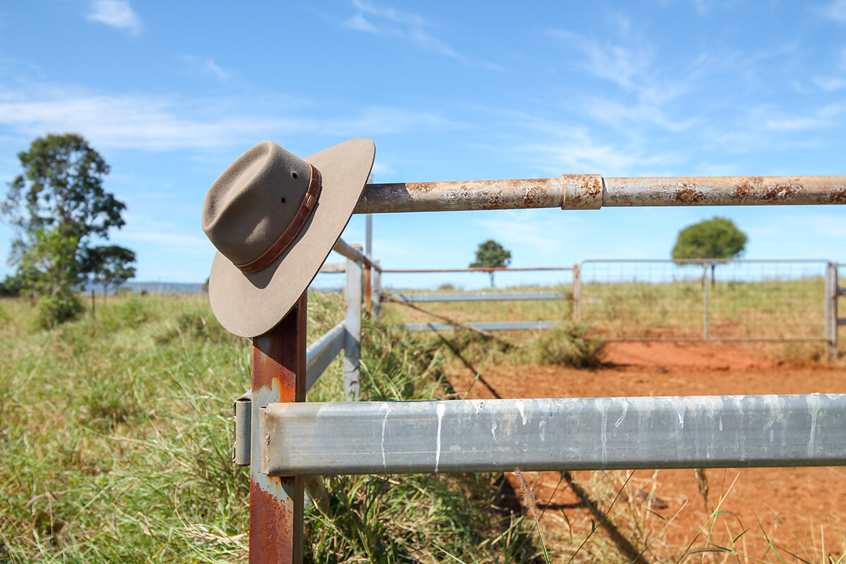 Hat on fence post in rural Queensland