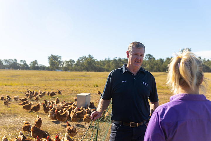 Regional Area Manager for the Wide Bay and Fraser Coast, Mark Barrett with Amanda Kuhn